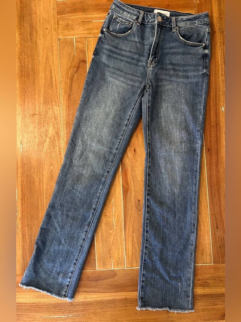 RISEN high rise slim straight leg with a raw hem. 5